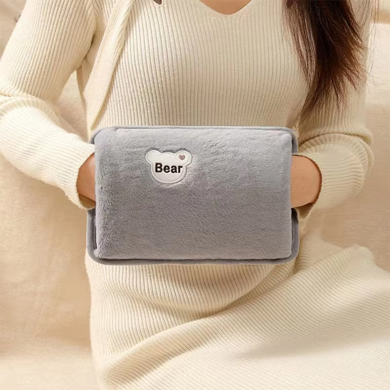 bouillotte electrique femme utilisation pour les mains